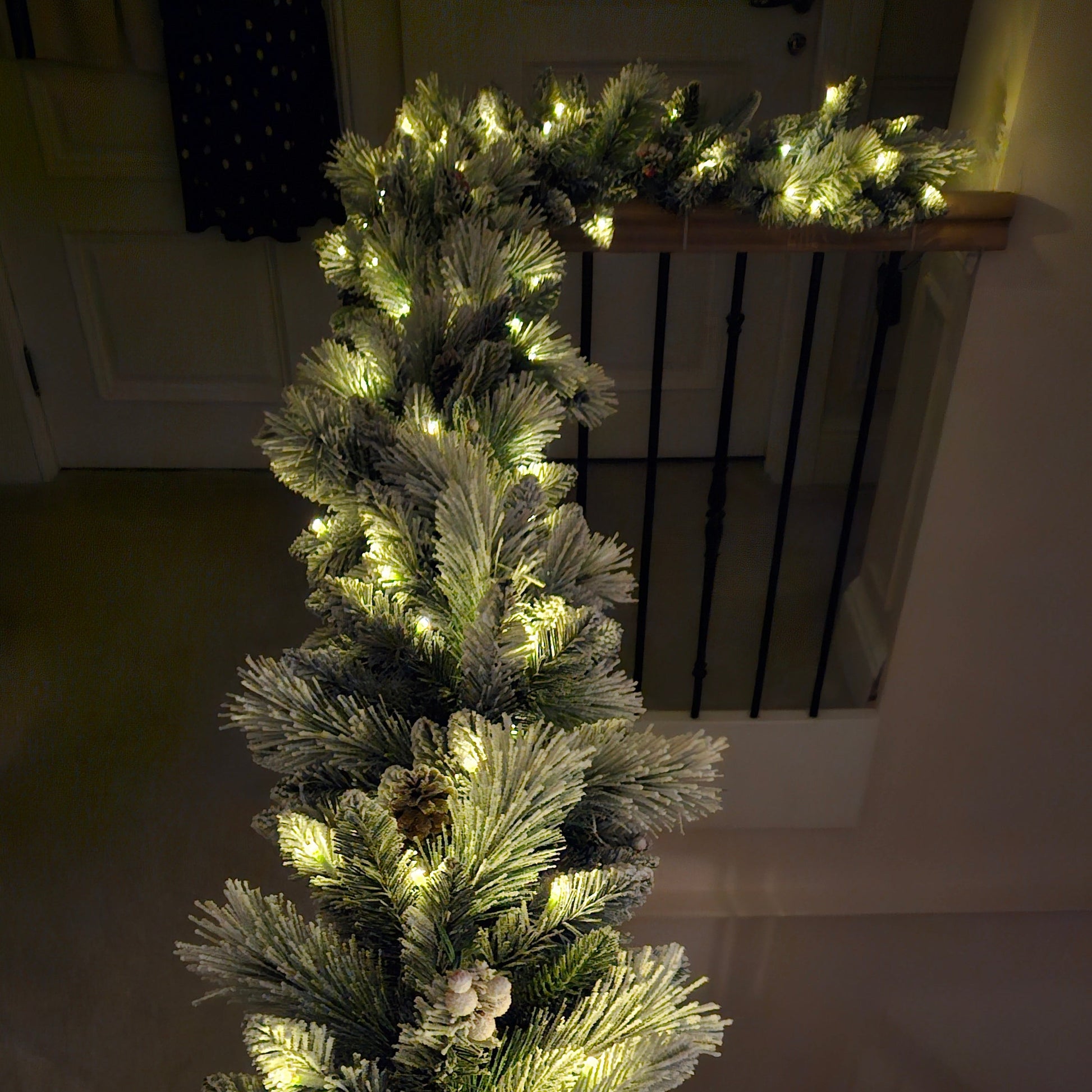 garland on stairway banister